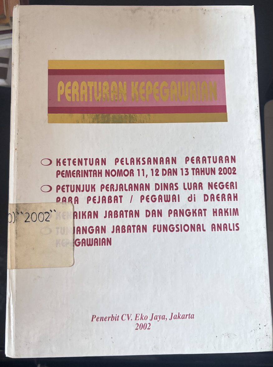 Cover Peraturan Kepegawaian 2002