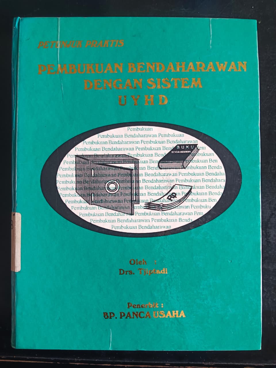 Cover Petunjuk Praktis Pembukuan Bendaharawan Dengan Sistem UYHD