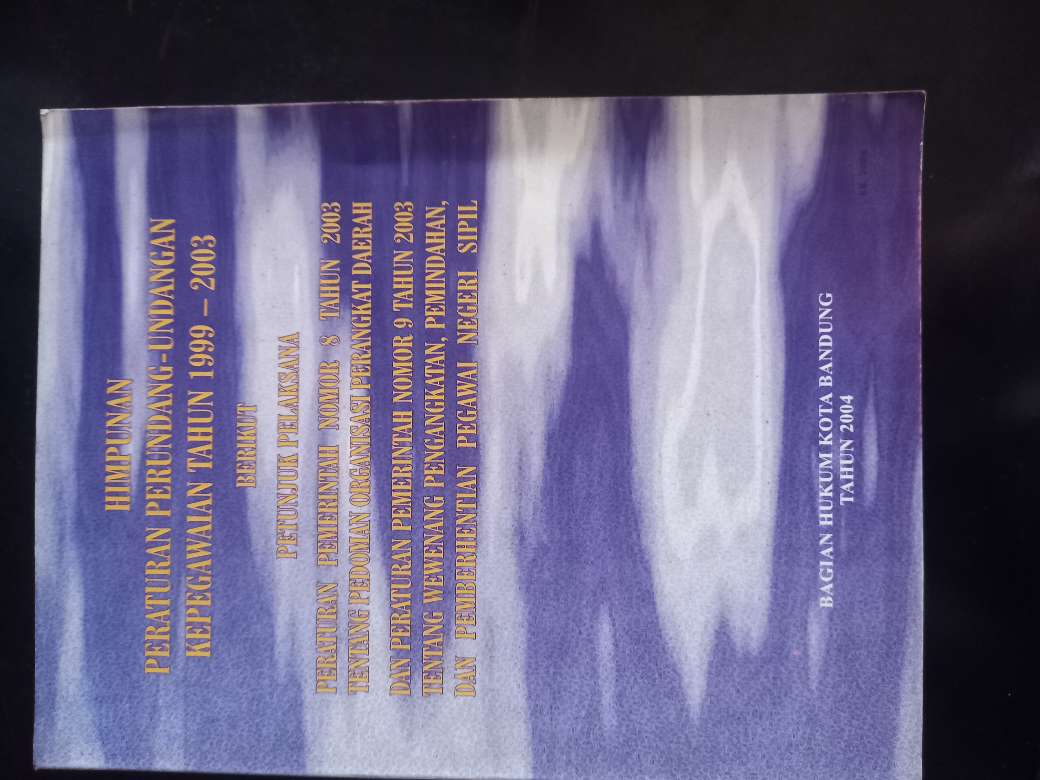 Cover Himpunan Peraturan Perundang - Undangan Kepegawaian Tahun 1999 - 2003 Berikut Petunjuk Pelaksana Peraturan Pemerintah Nomor 8 Tahun 2003 Tentang Pedomaan Organisasi Perangkat Daerah dan Peraturan Pemerintah Nomor 9 Tahun 2003 Tentang Wewenang Pengangkatan, Pemindahan, Dan Pemberhentian Pegawai Negeri Sipil